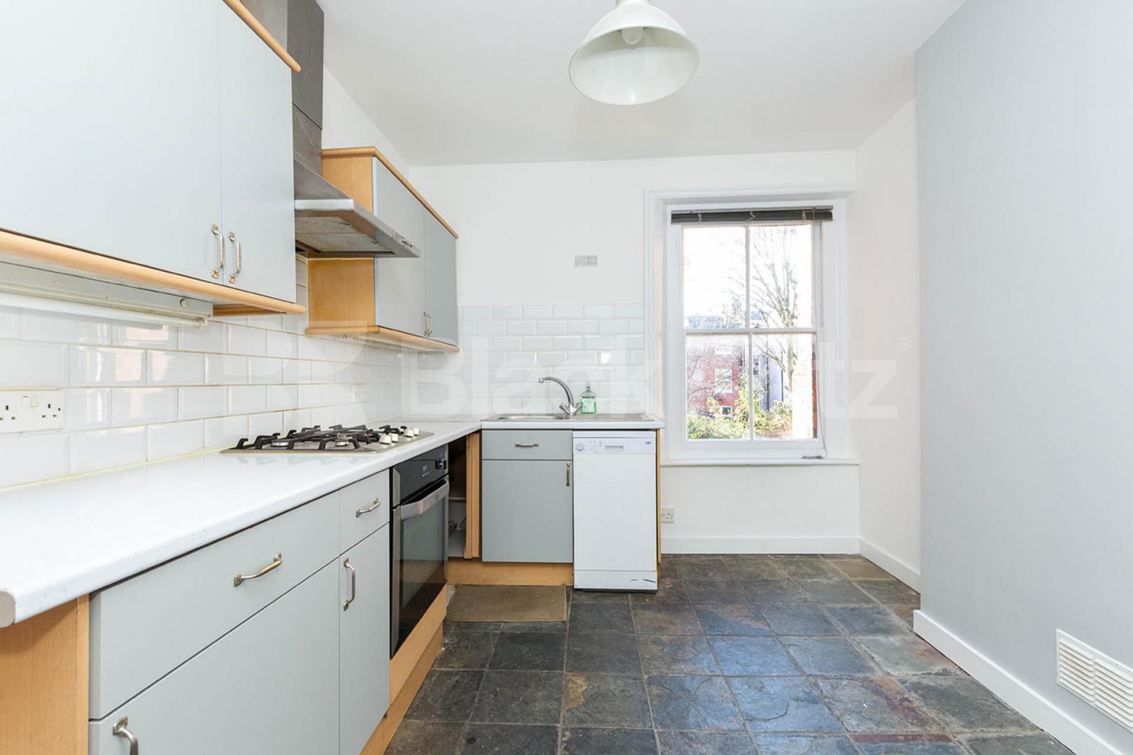Set over three levels with high ceilings and exposed brickwork Rathcoole Gardens, Crouch End